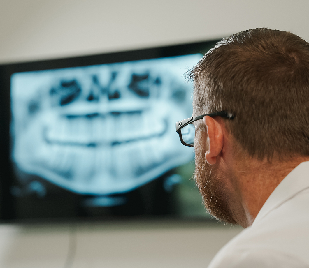 Clinical team examining a patient